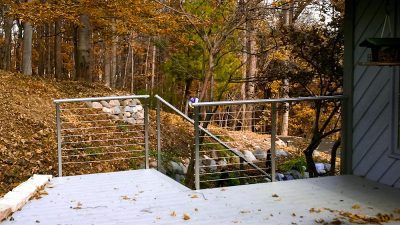 Maryland deck, stair, and porch railing. This 
Gaithersberg, MD, modern railing remodel looks beautiful. The Maryland deck remodel features Rainier cable railing.