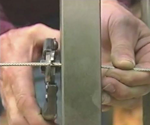 Cut the cable snug to the railing post.