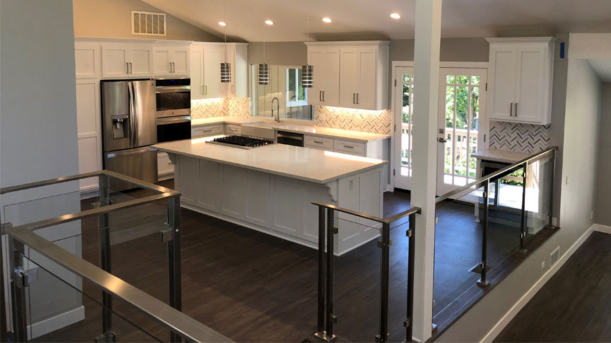Modern Interior with a Glacier Panel Railing by AGS Stainless