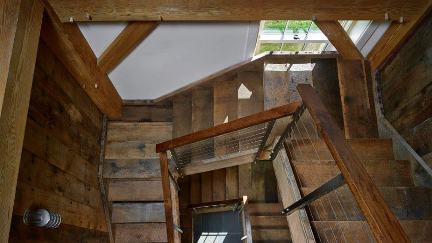 Rustic Interior with a Rainier Cable Railing by AGS Stainless