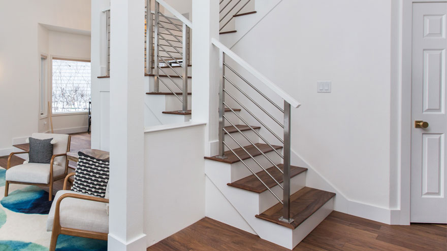Scandinavian Interior with an Olympus Bar Railing by AGS Stainless