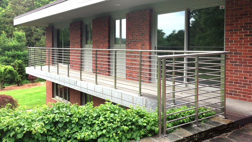 Horizontal rod stainless steel deck hand railing by AGS Stainless