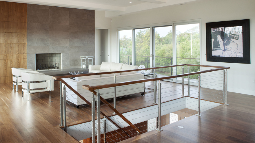Custom-designed cable railing on stairs.