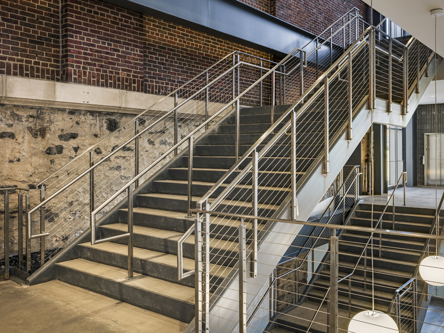 Rod stair rail vs. cable stair rail.