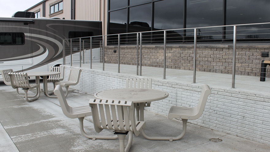 Core drill mounted cable railing system.