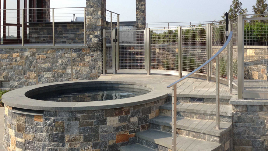 Cable railing with mesh panel railing.