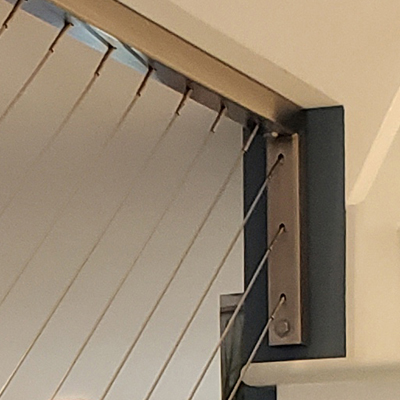 modified railing post, a special design to attach the railing post to the wall and ceiling, partially open staircase.