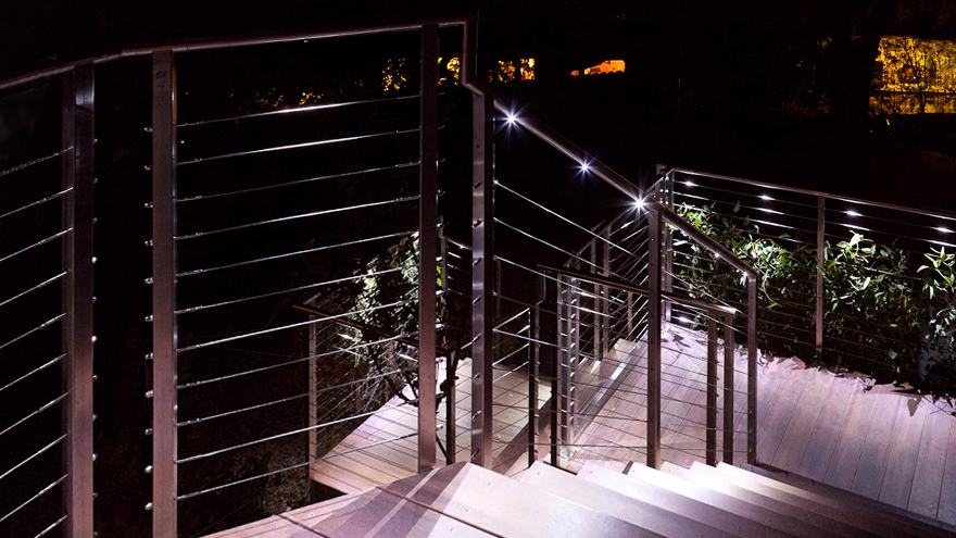 Outdoor deck lights are added to the handrail.
