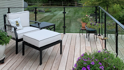 Powder coat black glass railing installed by general contractor in Middlesex County.